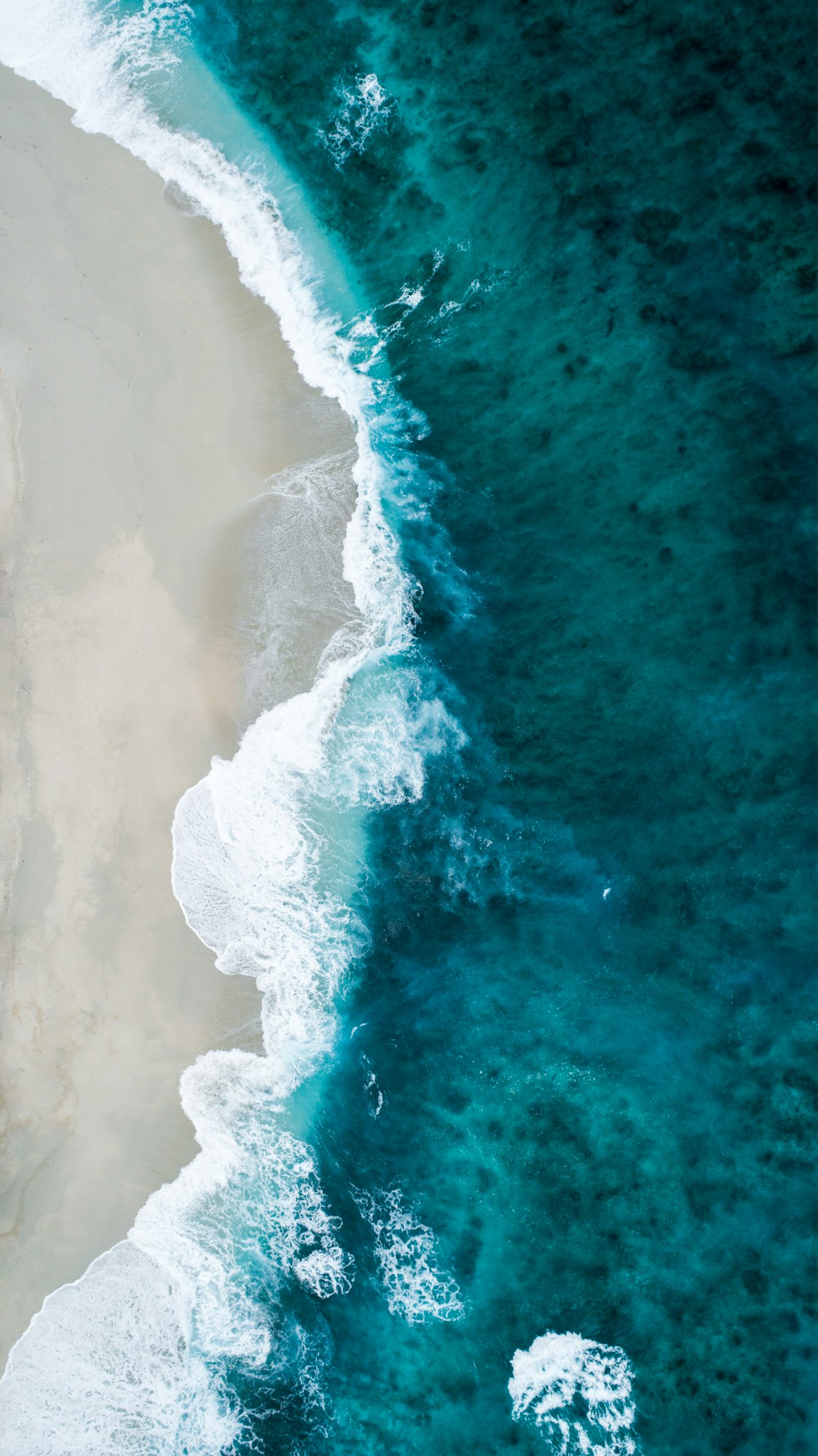 Aerial view of turquoise shoreline